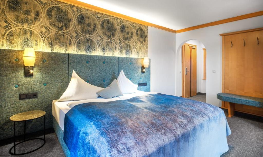 Postel nebo postele na pokoji v ubytování Hotel Königgut