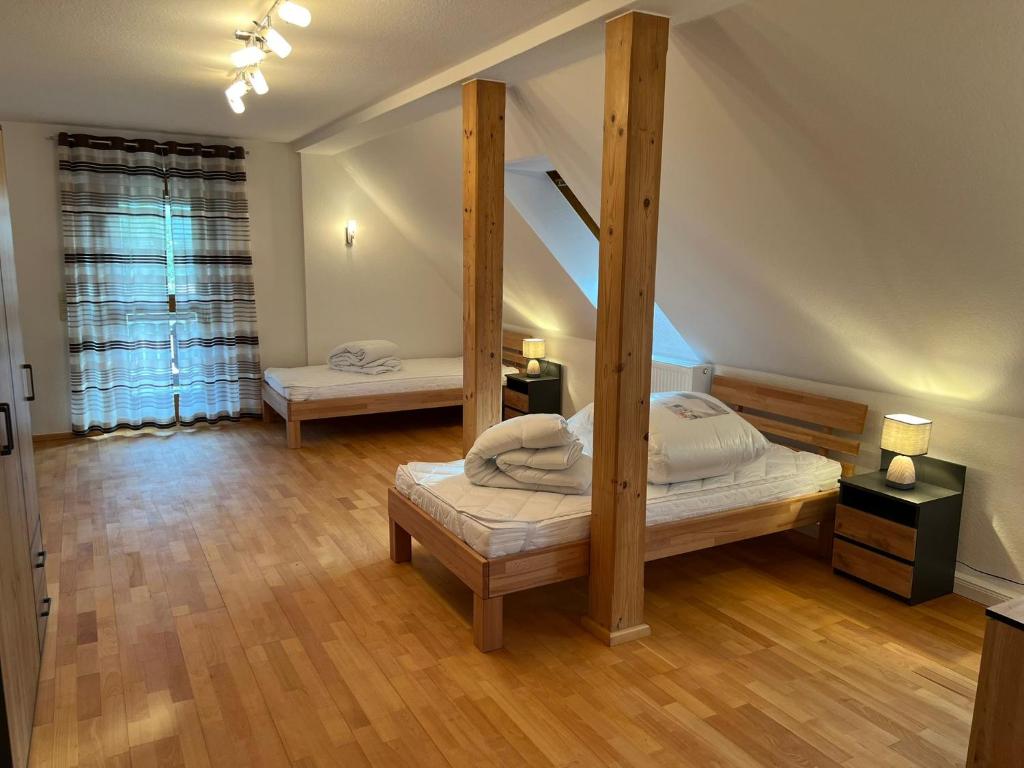 Postel nebo postele na pokoji v ubytování Gästezimmer Werwein