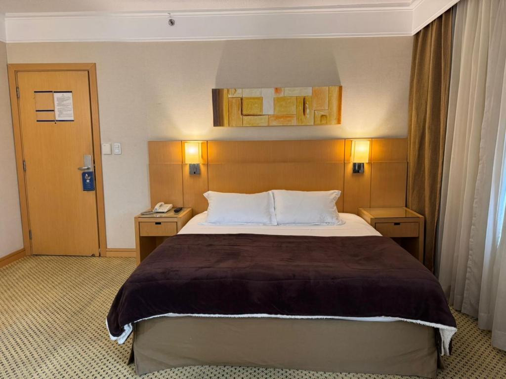 Postel nebo postele na pokoji v ubytování Flat Guarulhos - 2