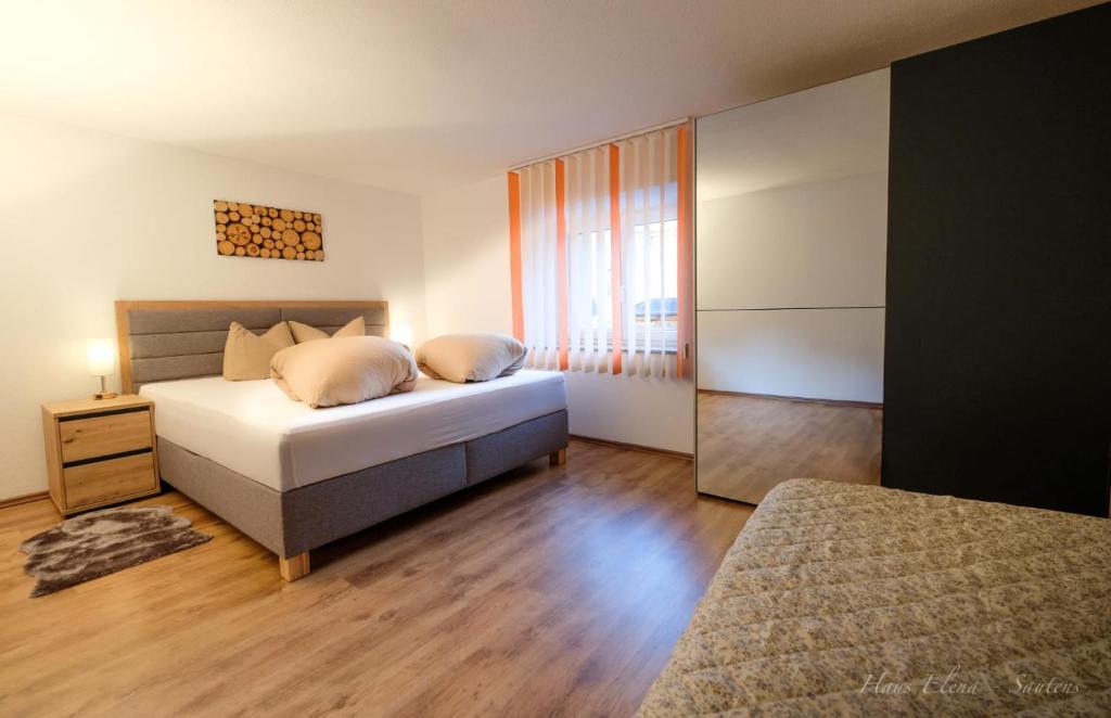 Postel nebo postele na pokoji v ubytování Haus Elena