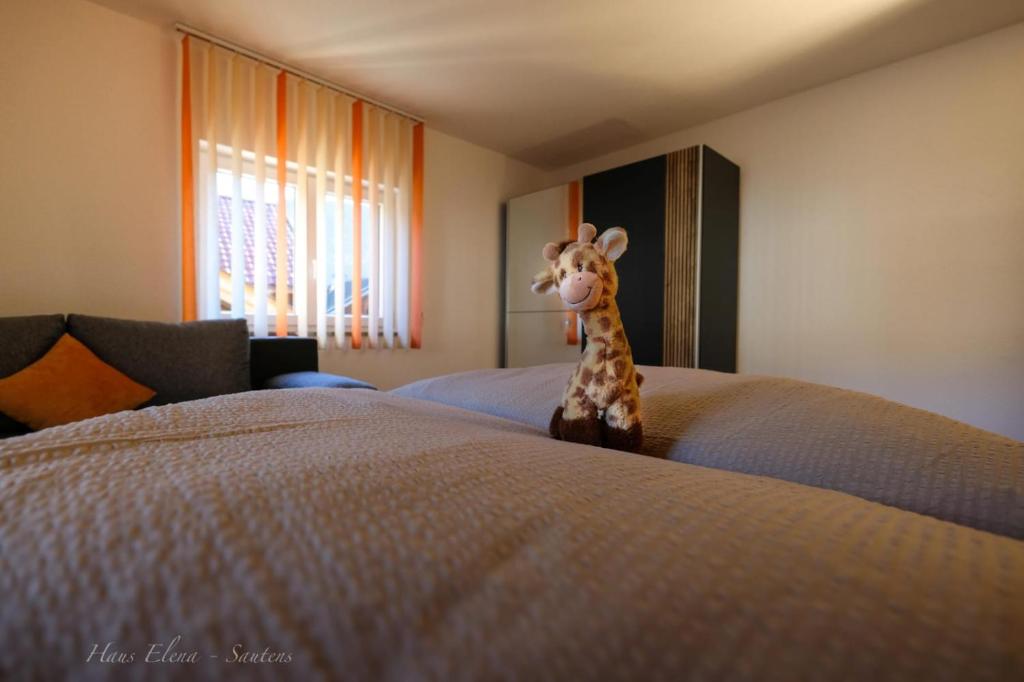 Postel nebo postele na pokoji v ubytování Haus Elena