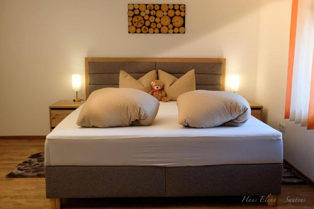 Postel nebo postele na pokoji v ubytování Haus Elena