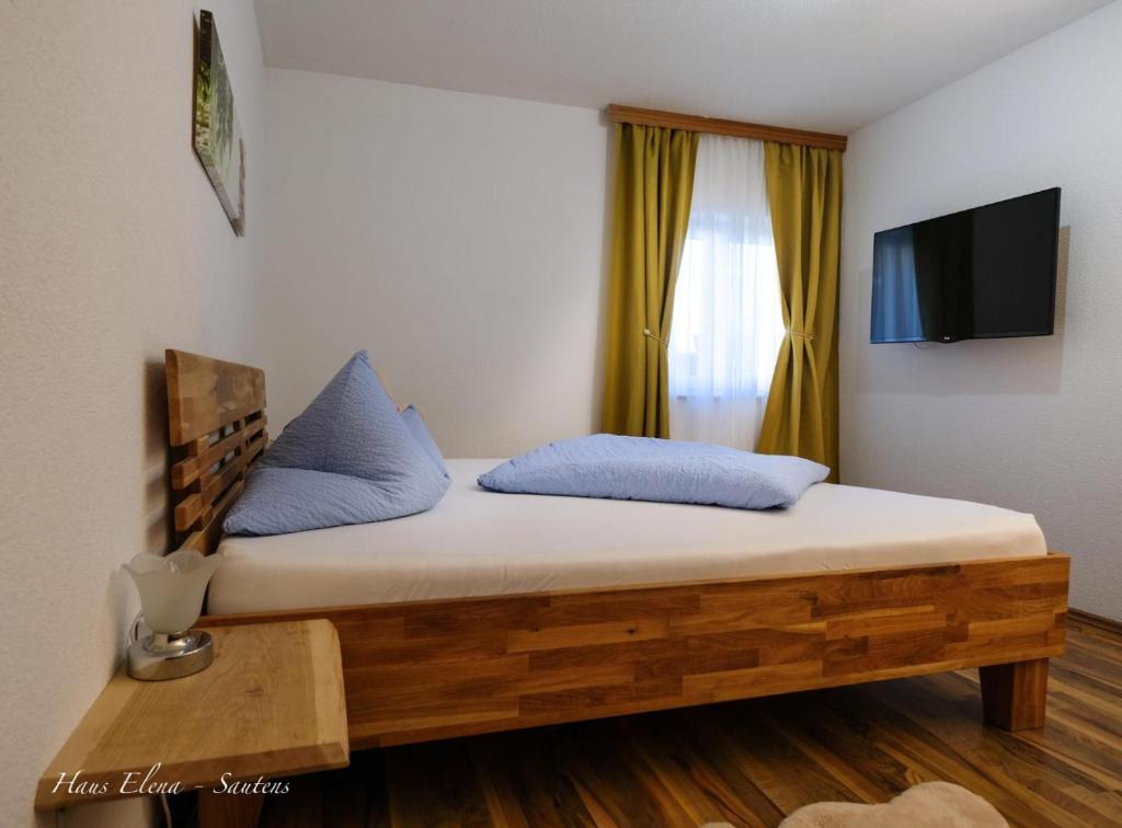 Postel nebo postele na pokoji v ubytování Haus Elena
