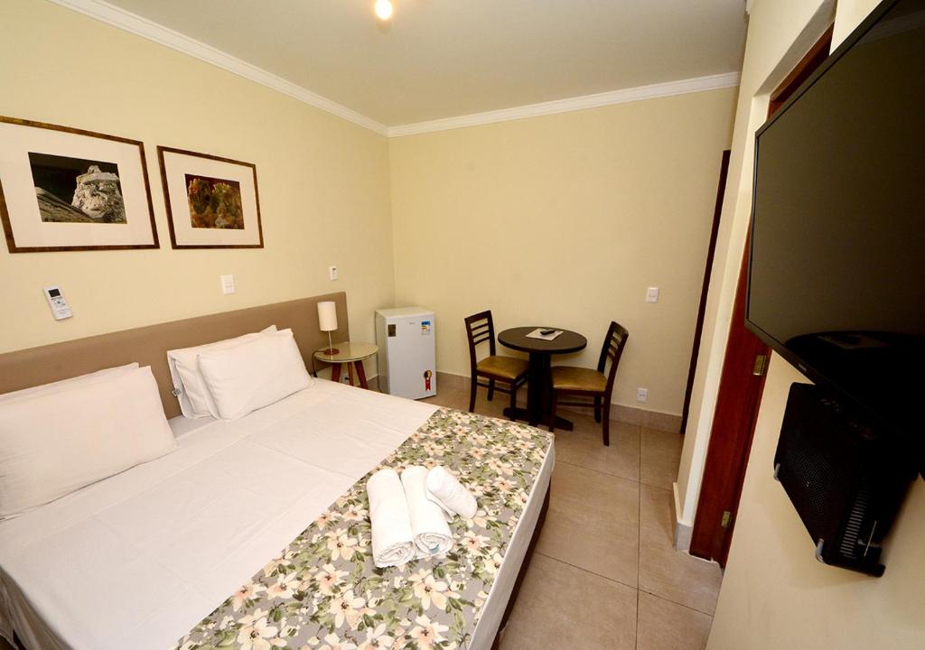 Postel nebo postele na pokoji v ubytování Hotel Passaledo