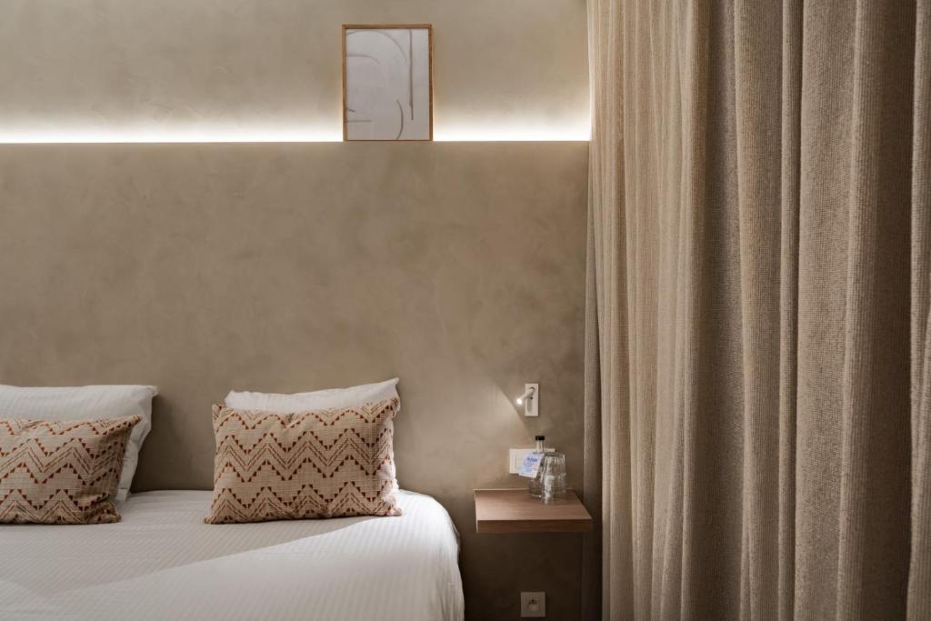 Cama o camas de una habitación en Hotel Astoria Gent