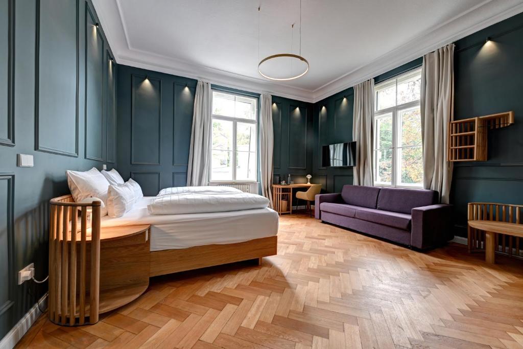 Postel nebo postele na pokoji v ubytování Hotel Uhland