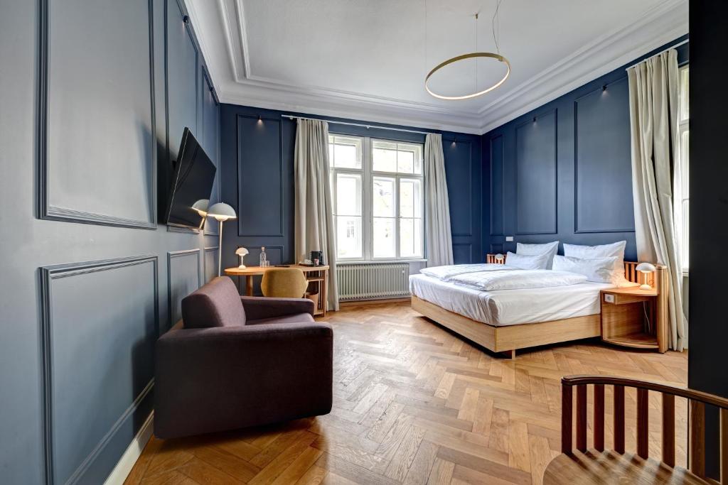 Postel nebo postele na pokoji v ubytování Hotel Uhland