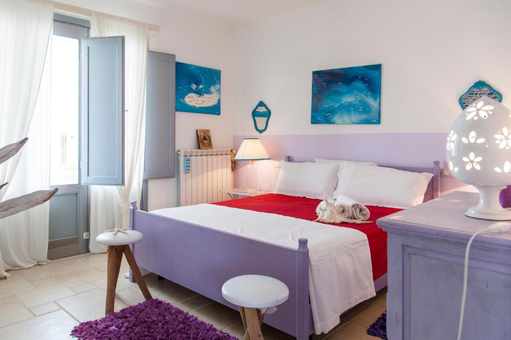 Posteľ alebo postele v izbe v ubytovaní Le Terrazze