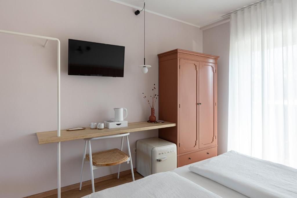 Postel nebo postele na pokoji v ubytování Hotel Trento Alta