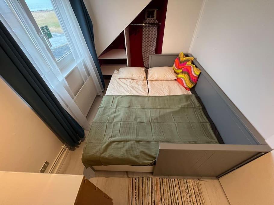 Postel nebo postele na pokoji v ubytování Luk House