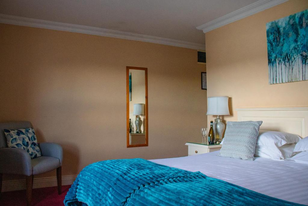 Katil atau katil-katil dalam bilik di The Moorings Hotel & Seafood Restaurant