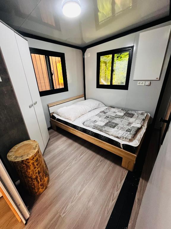 Postel nebo postele na pokoji v ubytování Ferienhaus Zeulenrodaer Meer