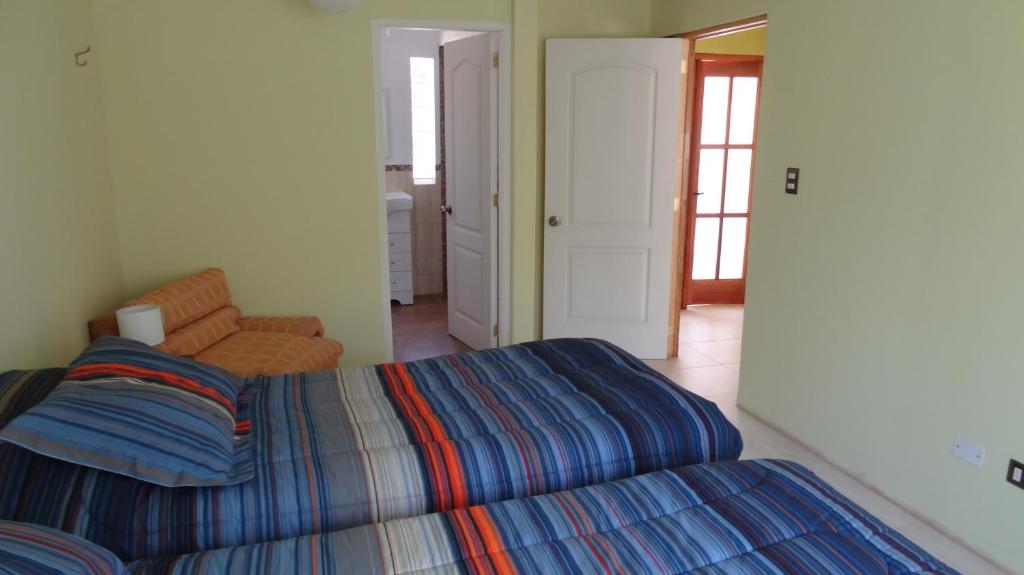 Una cama o camas en una habitación de Tralka B&B