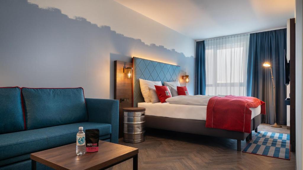 Postel nebo postele na pokoji v ubytování Holiday Inn - the niu, Keg Hamburg Ost by IHG