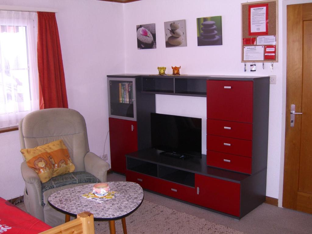 Predel za sedenje v nastanitvi Ferienwohnung Tschudiboden