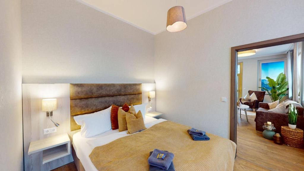 Postel nebo postele na pokoji v ubytování Hotel am Stadtpark Nordhausen