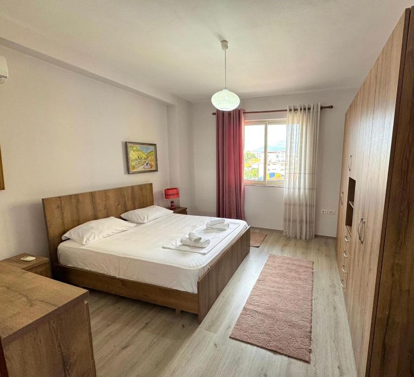 Voodi või voodid majutusasutuse Shkodra Apartments toas
