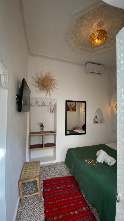 Postel nebo postele na pokoji v ubytování Riad Morocco Sky