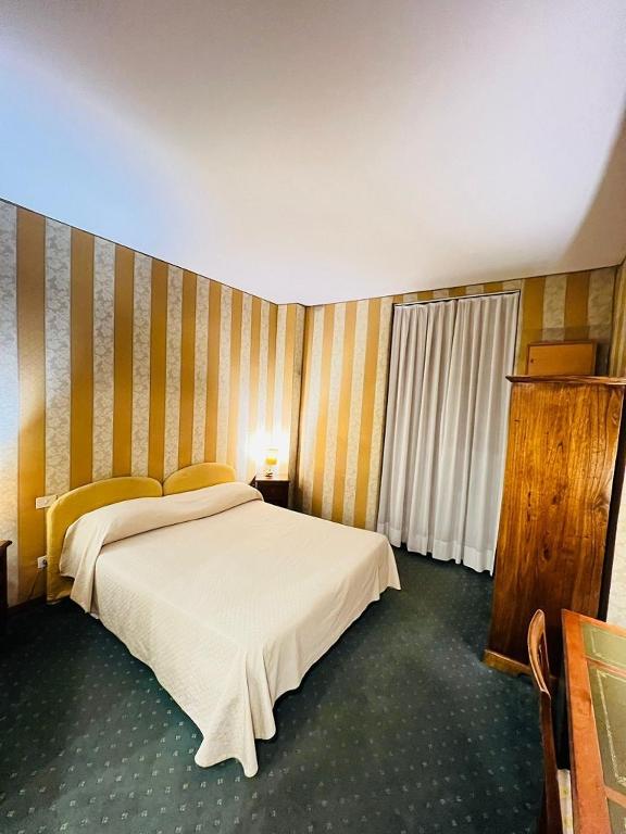 Posteľ alebo postele v izbe v ubytovaní Orange Garden Guest House