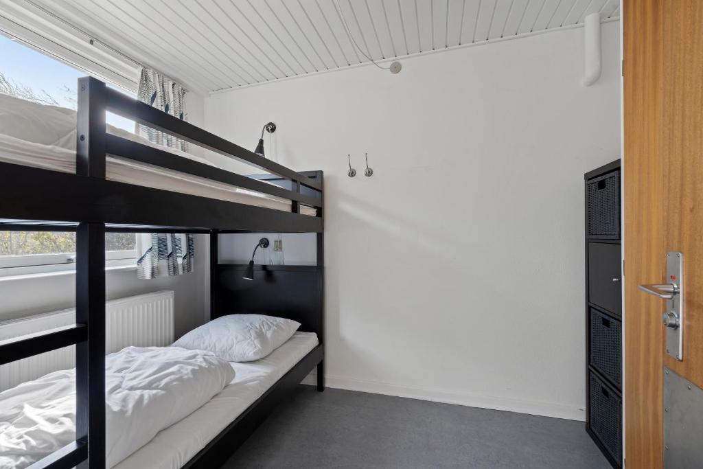 Postel nebo postele na pokoji v ubytování Beachfront Apartment D 2 Bedrooms Free Parking