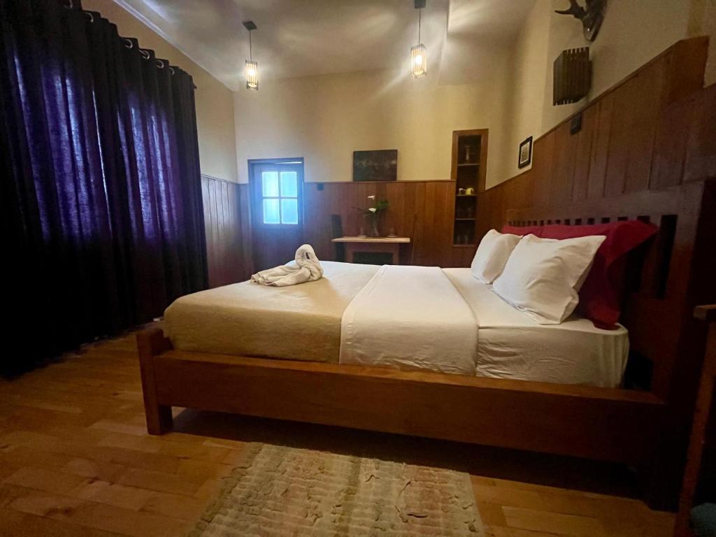 Postel nebo postele na pokoji v ubytování Lily Bank Cottage