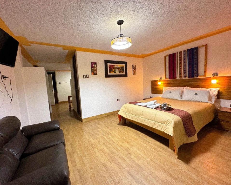 Postel nebo postele na pokoji v ubytování Tambo Lodge Canta