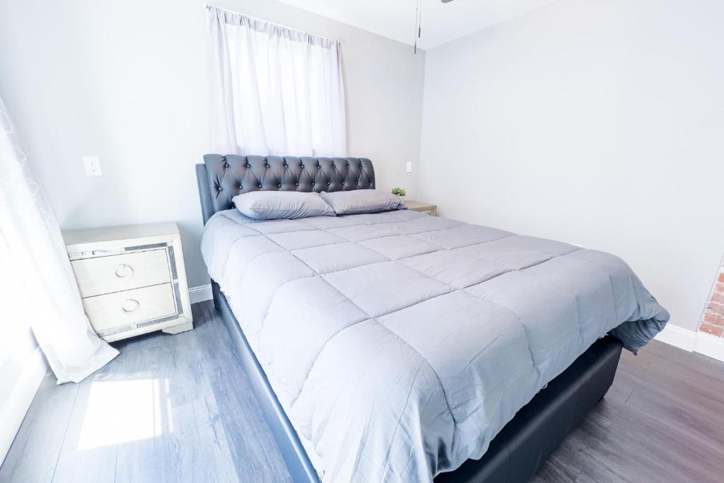 Postel nebo postele na pokoji v ubytování Modern 5BR Home Perfect for Families