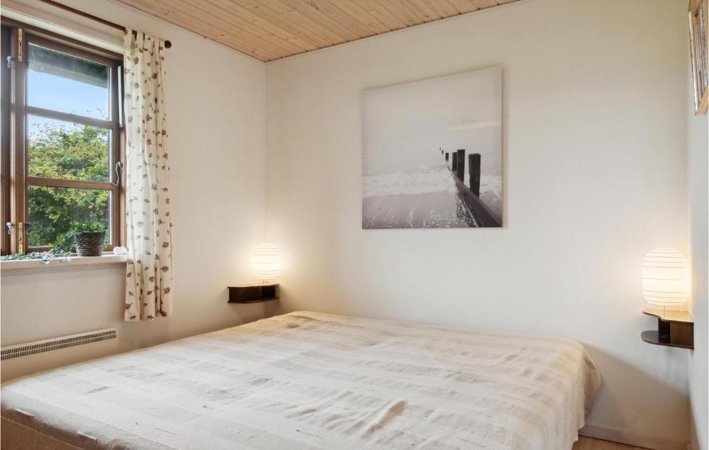 Postel nebo postele na pokoji v ubytování Holiday Home Brunebanke Glesborg
