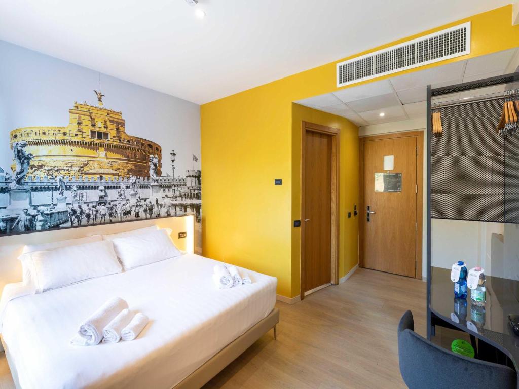 Postel nebo postele na pokoji v ubytování B&B Hotel Roma Tuscolana San Giovanni