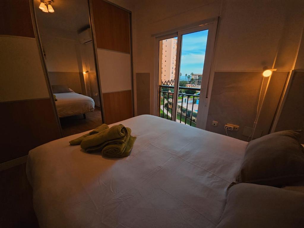 Postel nebo postele na pokoji v ubytování Apartamento paseo marítimo de Playamar