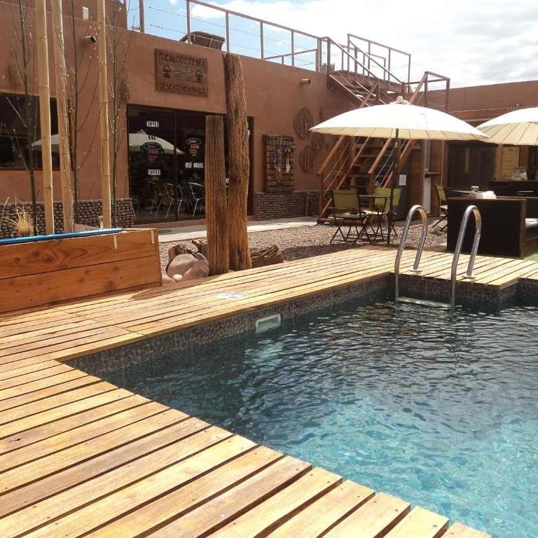 Bazén v ubytování Hoteles Pueblo de Tierra nebo v jeho okolí