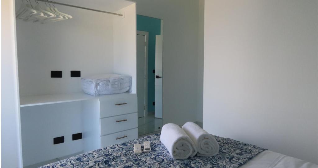 Postel nebo postele na pokoji v ubytování All Seasons Hotel