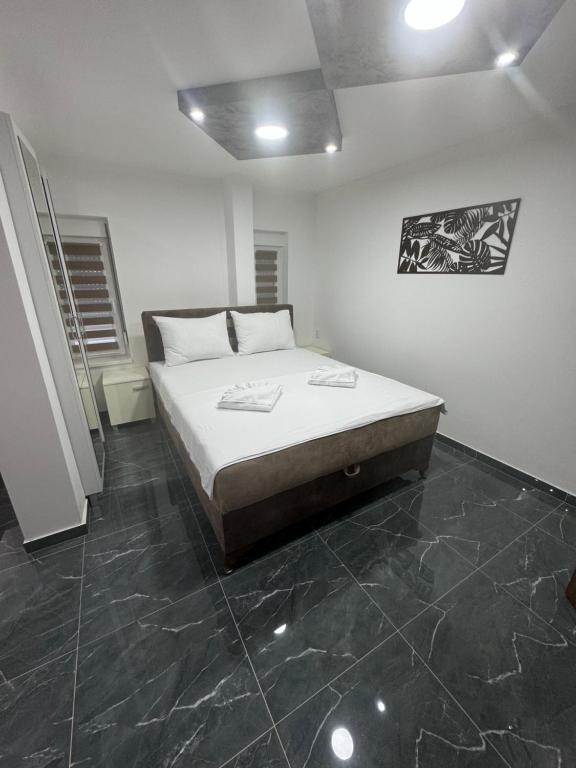 Voodi või voodid majutusasutuse Sobe i Apartmani Casa Mia toas