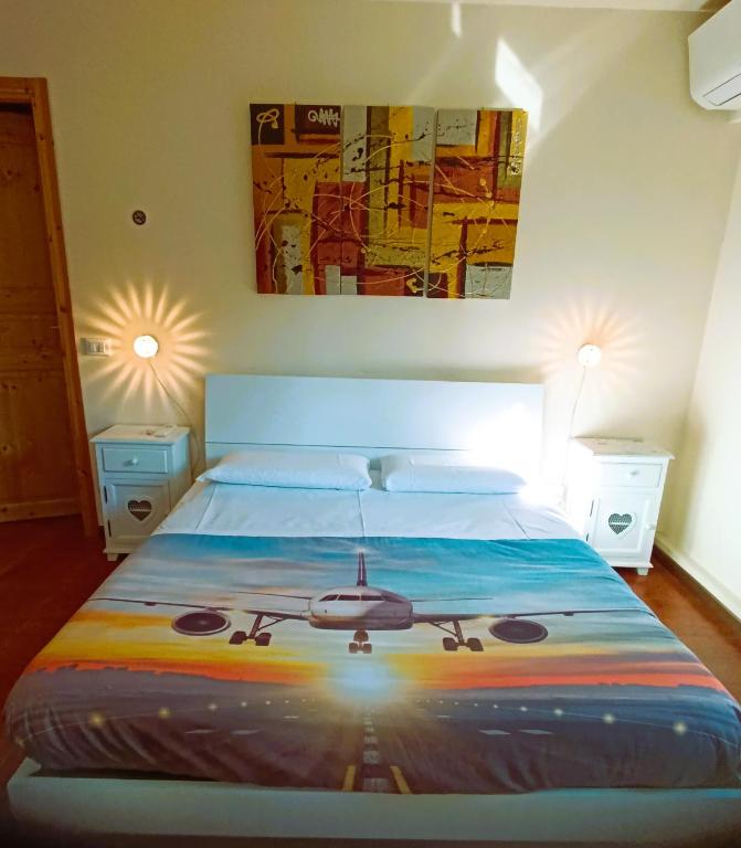 Postel nebo postele na pokoji v ubytování FlyBGY