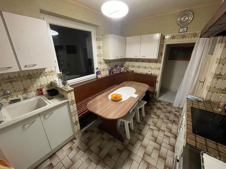 Kuchyň nebo kuchyňský kout v ubytování Aux Portes Du Parc