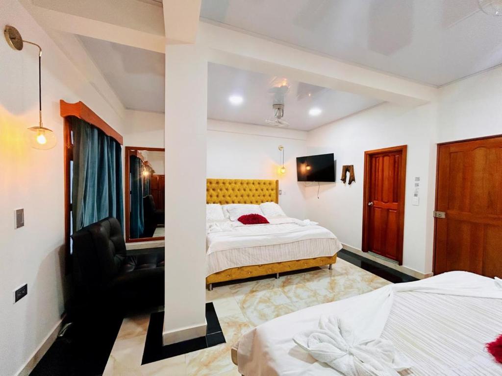 Postel nebo postele na pokoji v ubytování Hotel Glorial