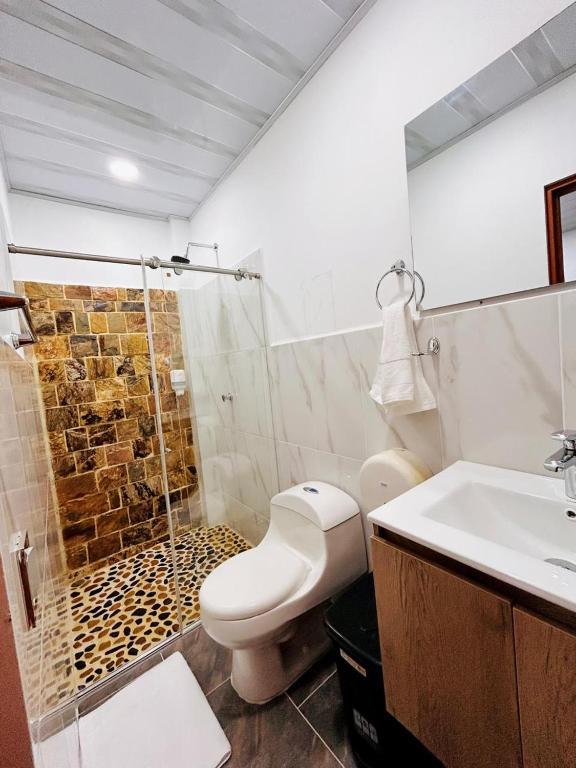 Koupelna v ubytování Hotel Glorial