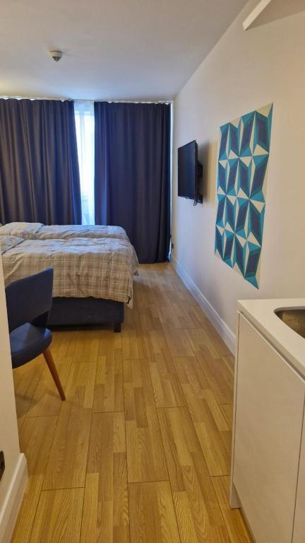 Postel nebo postele na pokoji v ubytování Lamar hotel