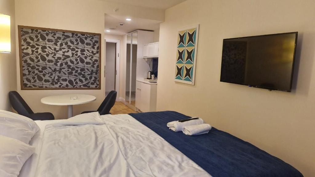 Postel nebo postele na pokoji v ubytování Lamar hotel