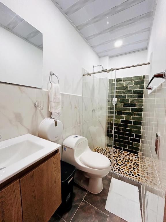 Koupelna v ubytování Hotel Glorial