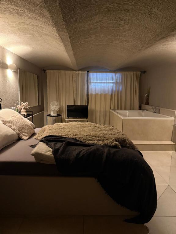 Ένα ή περισσότερα κρεβάτια σε δωμάτιο στο OhMySpa - Bed & Bath