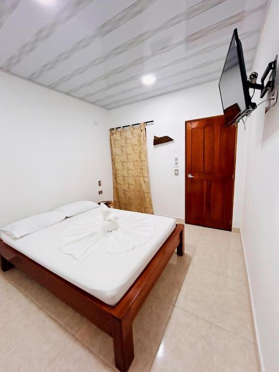 Postel nebo postele na pokoji v ubytování Hotel Glorial