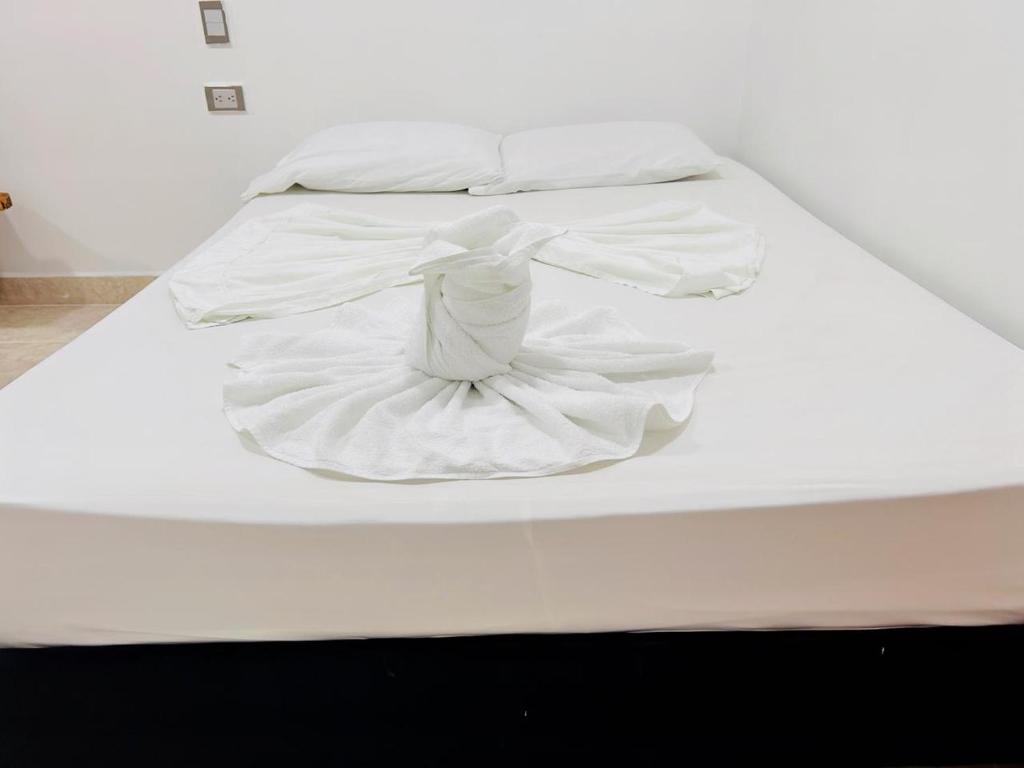 Postel nebo postele na pokoji v ubytování Hotel Glorial