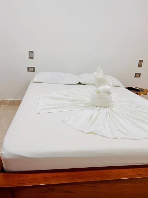 Postel nebo postele na pokoji v ubytování Hotel Glorial