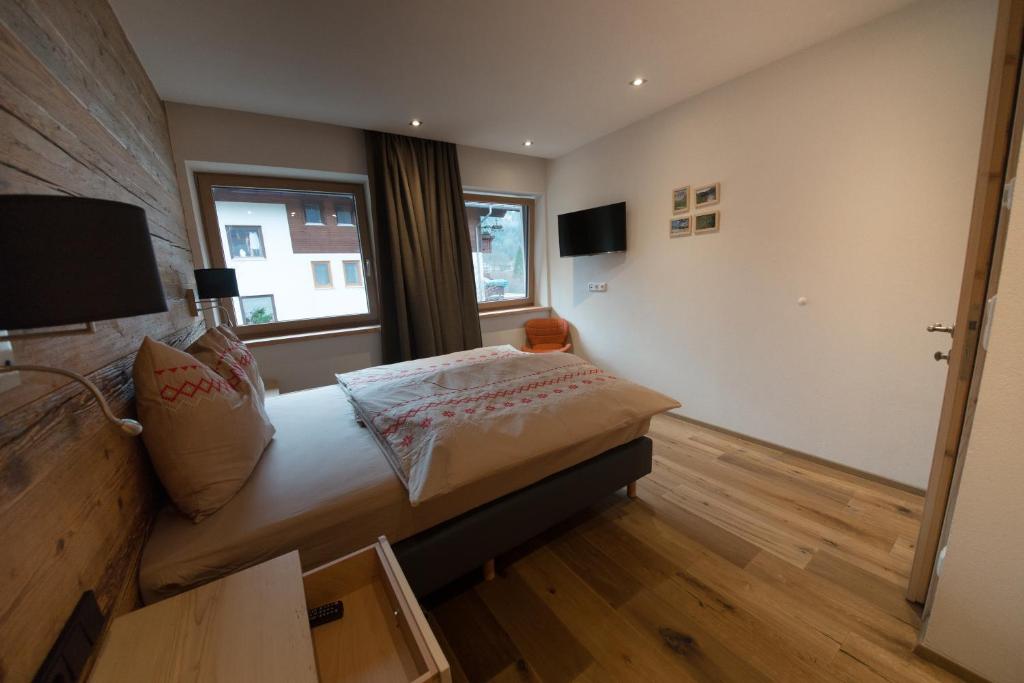 Televízia a/alebo spoločenská miestnosť v ubytovaní Appartement Romy