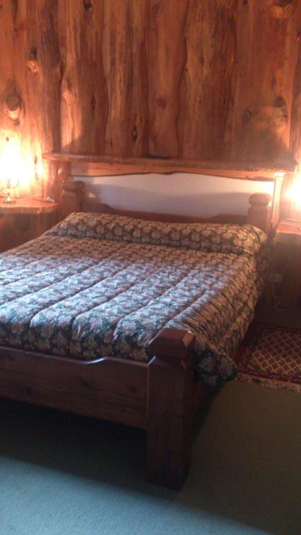 Postel nebo postele na pokoji v ubytování Posada del Angel