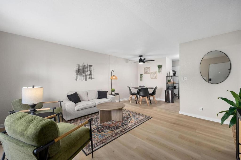 a living room with a couch and a table at Hines Haven - Unit 2 - Perfect BNB for YOU in Peoria