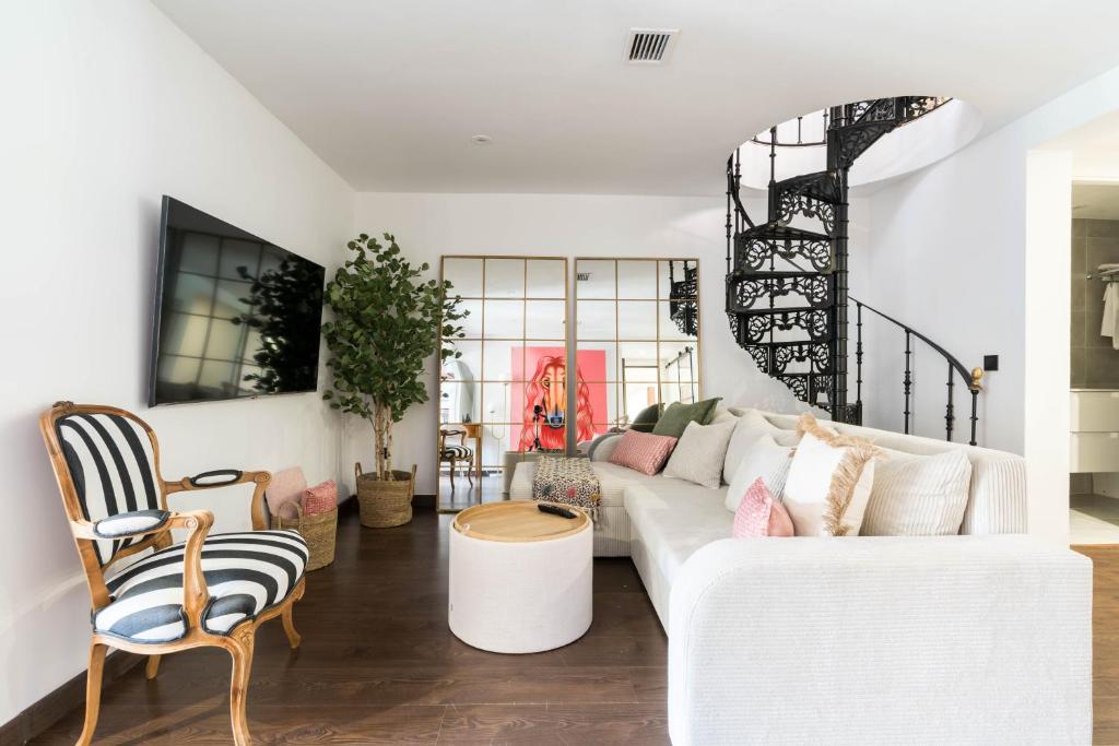 Posezení v ubytování Clavileña, duplex con las mejores vistas de Alcala