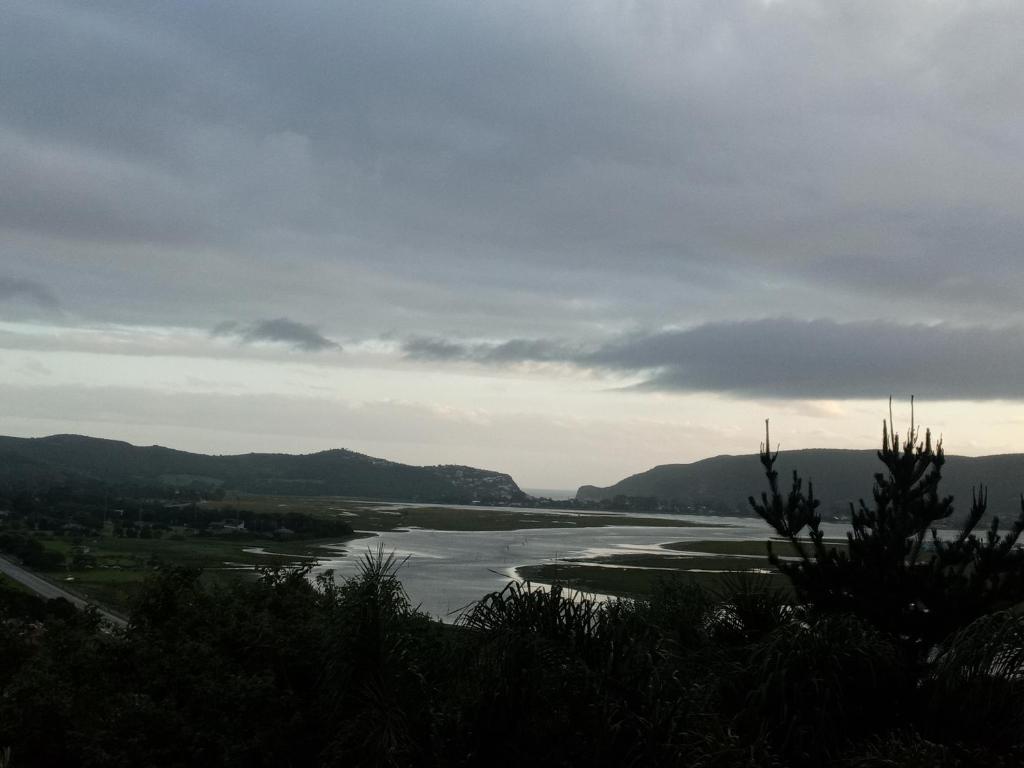 a view of a river with mountains in the background at Knysna Nature's View in Knysna