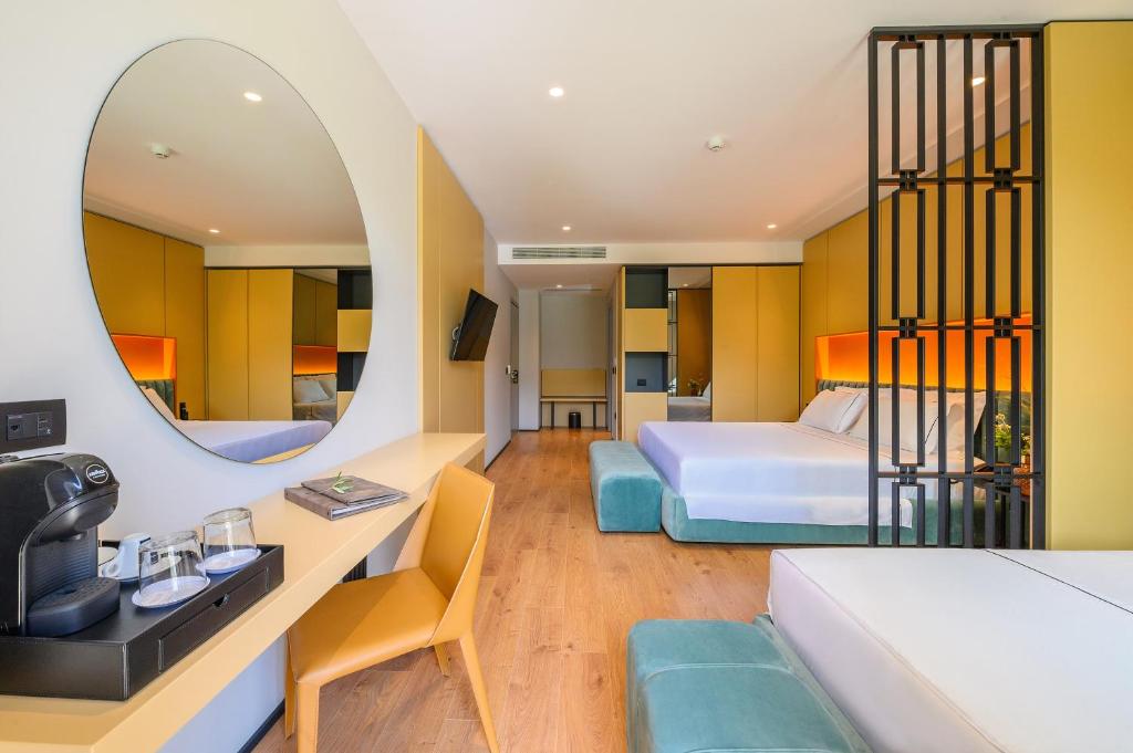 Postel nebo postele na pokoji v ubytování Miamar Luxury Hotel & Spa